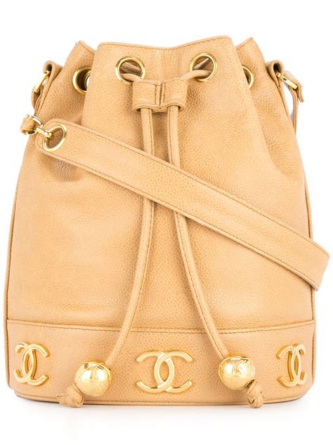 farfetch chanel drawstring bag.